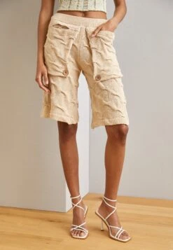 Full Fashioned With Extended Pockets Elastic Waist And Handcrafted Button Detail - Shorts - Off White